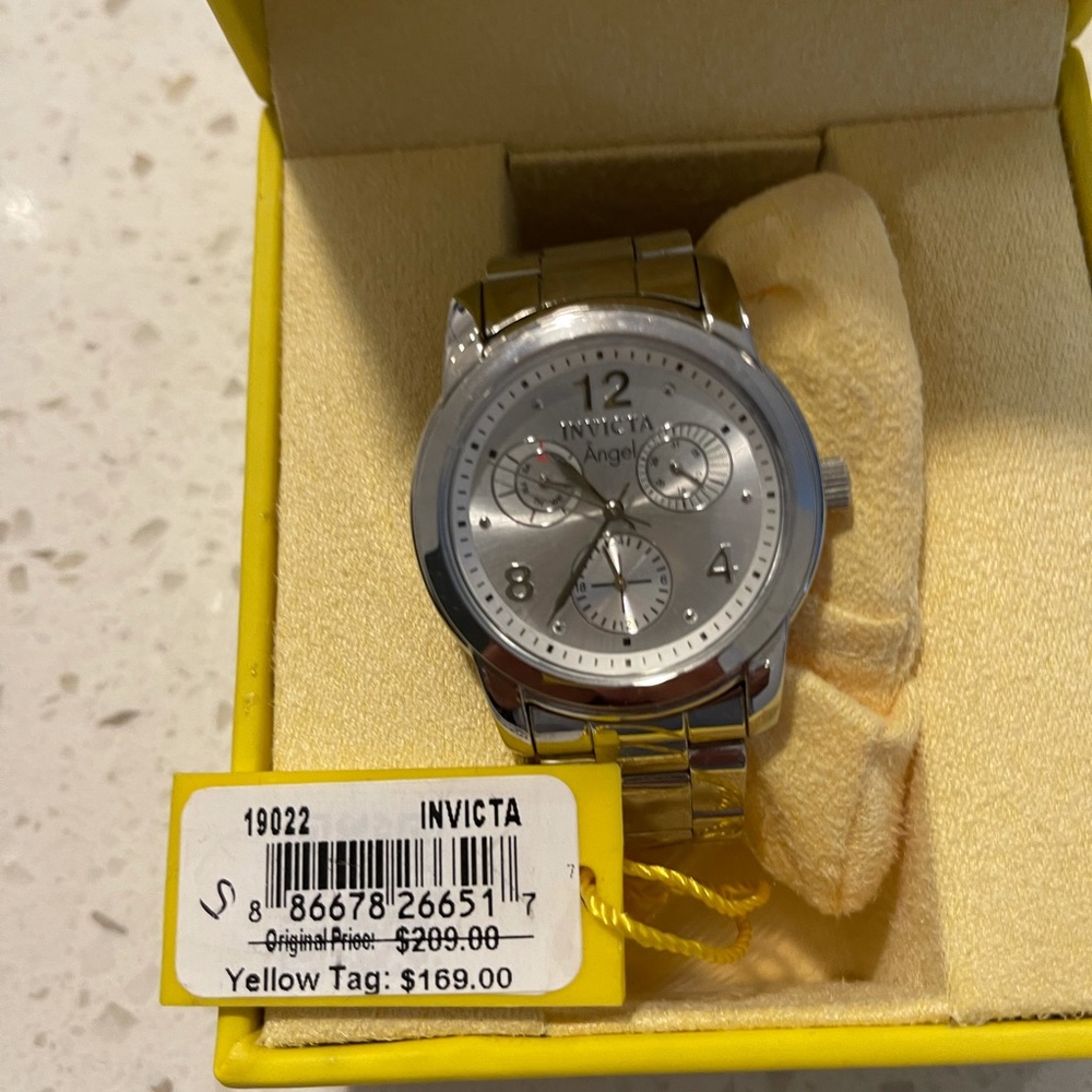 watches one is silver and the other one is gold